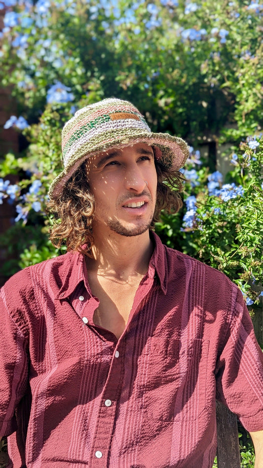 Man wearing sustainable woven bucket hat